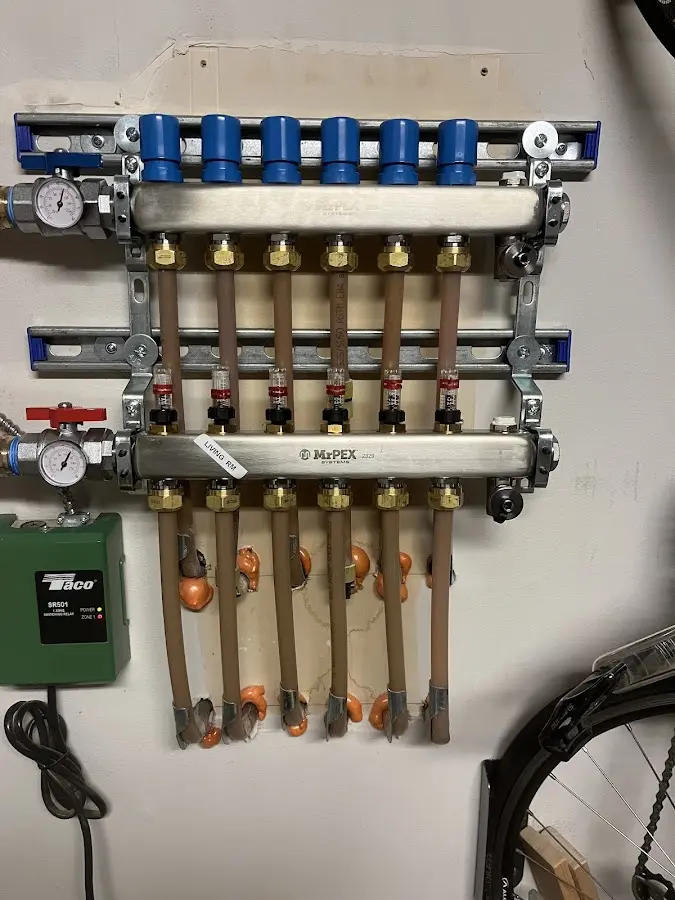 Plumber performing Gas Leak Detection at a residential property in Grosse Ile